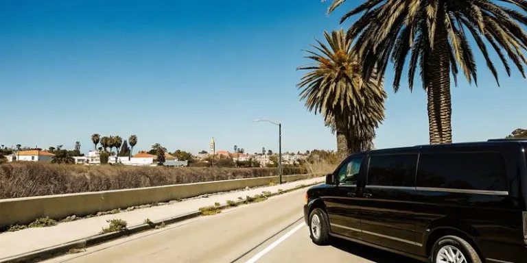 Private black van shuttle on highway from LAX to Anaheim